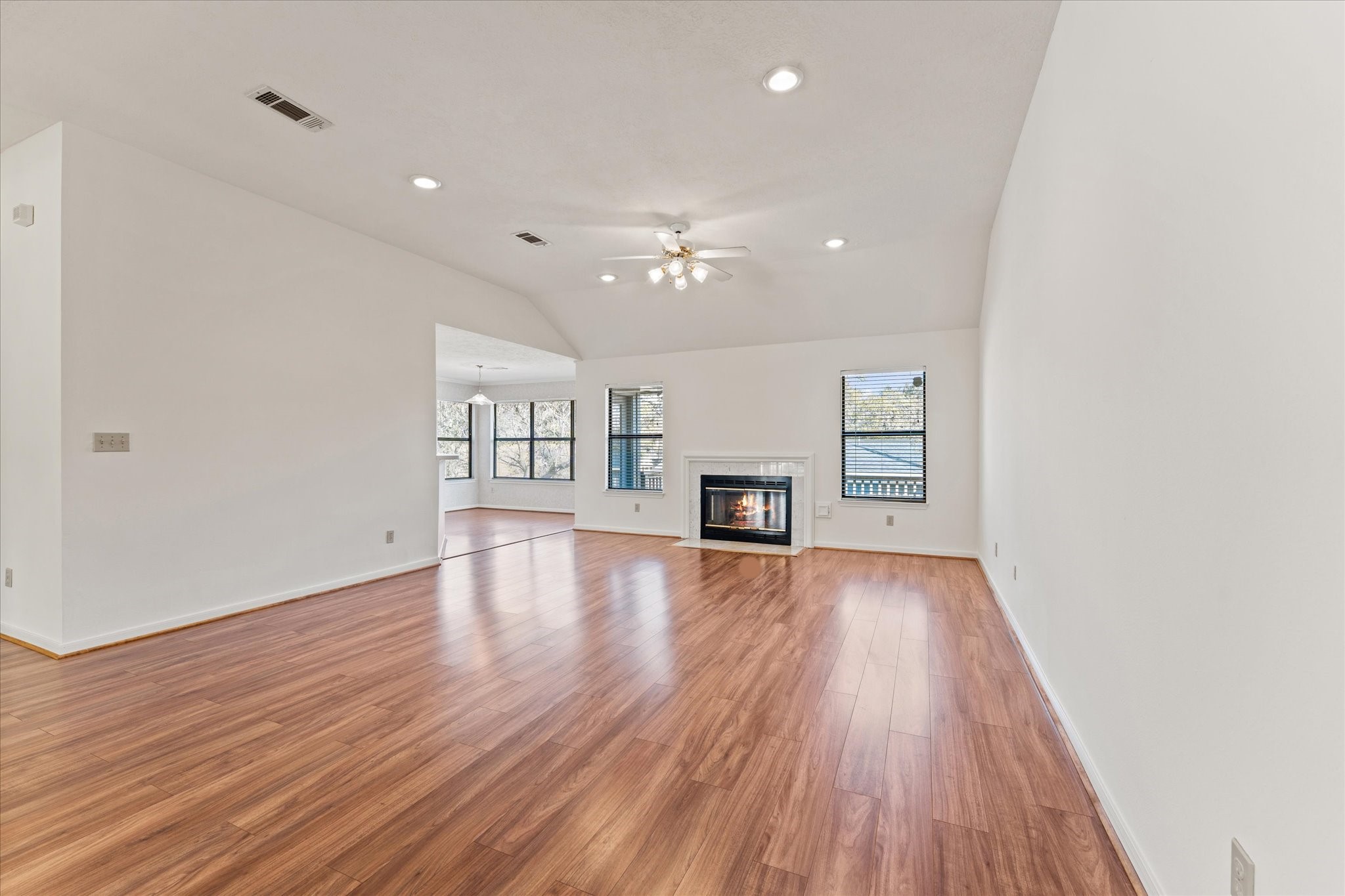 215 Deep Dale Lane Conroe, TX 77304 - Photo 11 of 34 You'll love the freshly painted walls and the wood plank flooring!