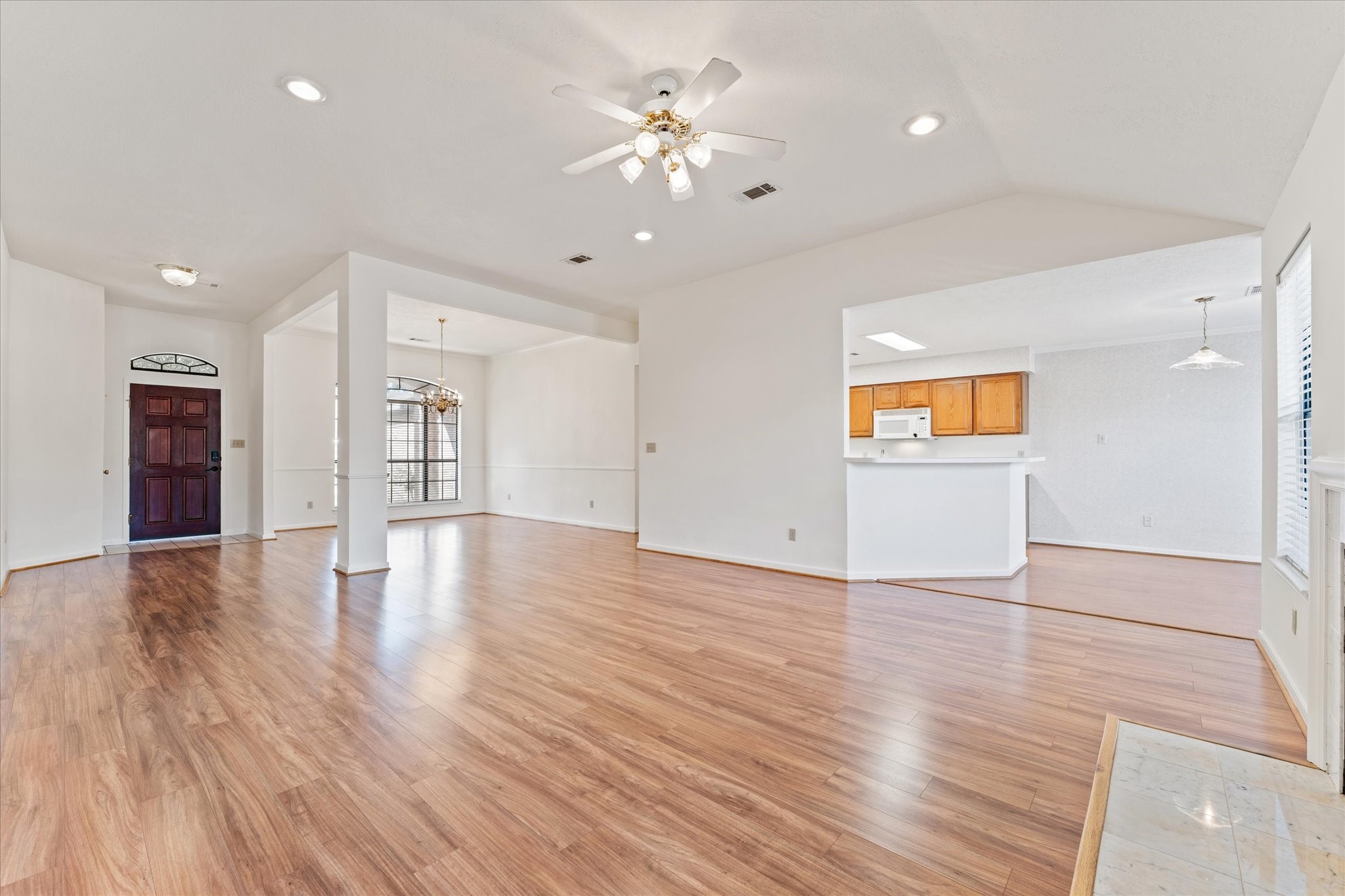 215 Deep Dale Lane Conroe, TX 77304 - Photo 12 of 34 View from the living room looking towards the kitchen & dining areas.