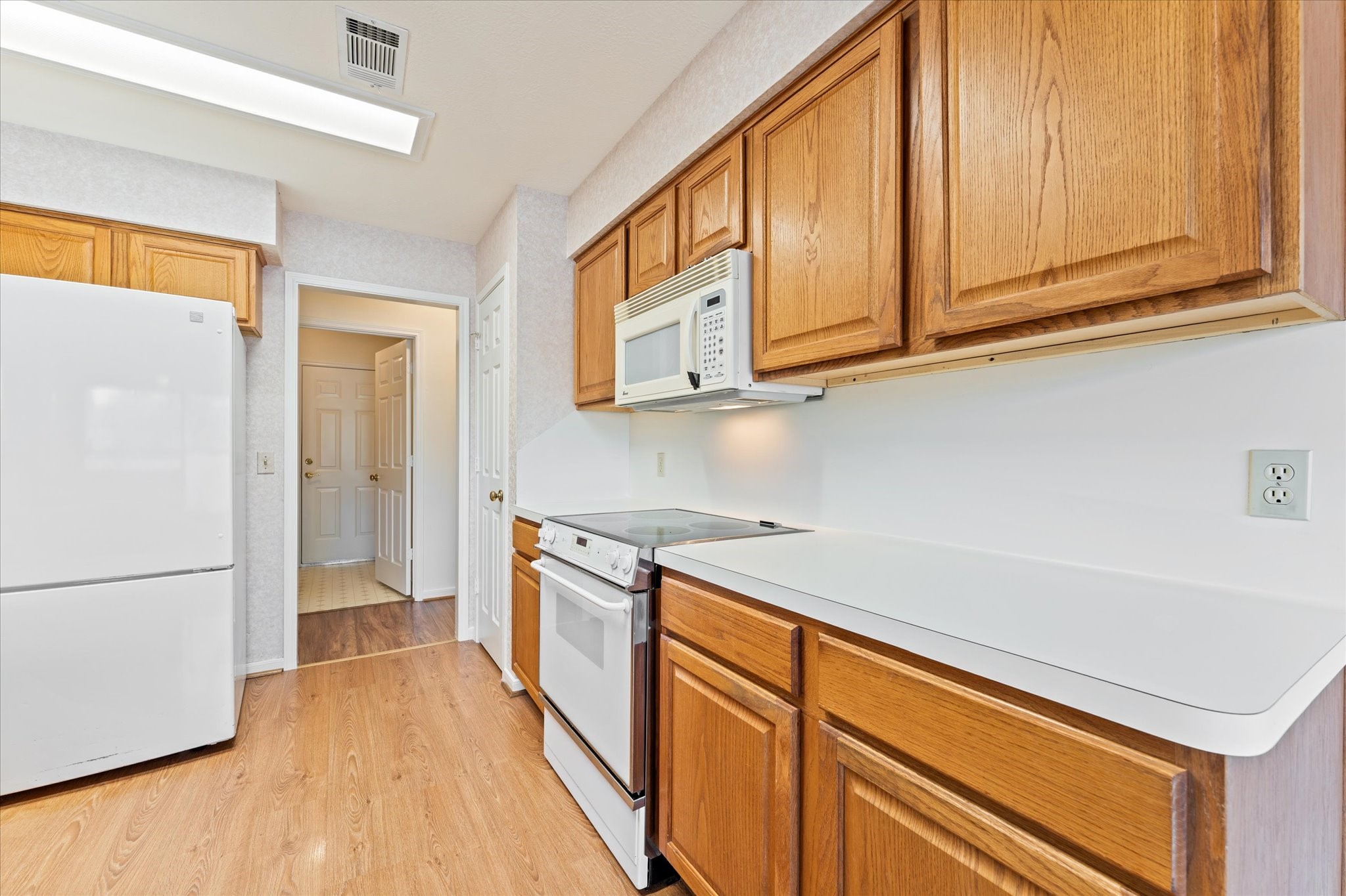 215 Deep Dale Lane Conroe, TX 77304 - Photo 16 of 34 Matching refrigerator is included.