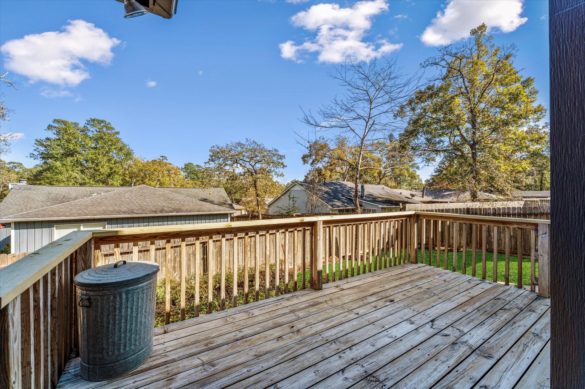 215 Deep Dale Lane Conroe, TX 77304 - Photo 27 of 34 Enjoy this "birds eye" view from the 12x12 backyard deck.