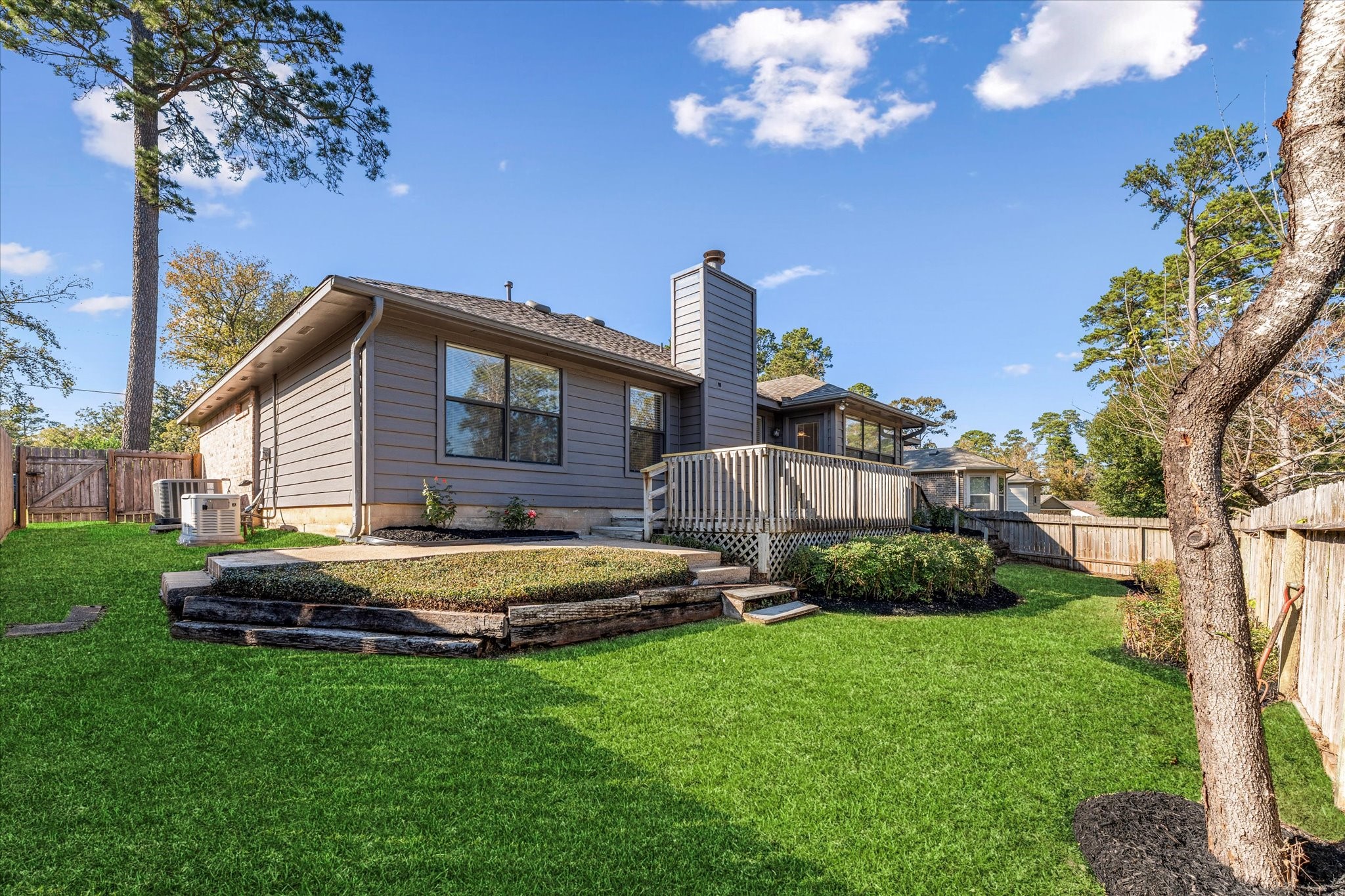 215 Deep Dale Lane Conroe, TX 77304 - Photo 29 of 34 Rear corner view of this home...