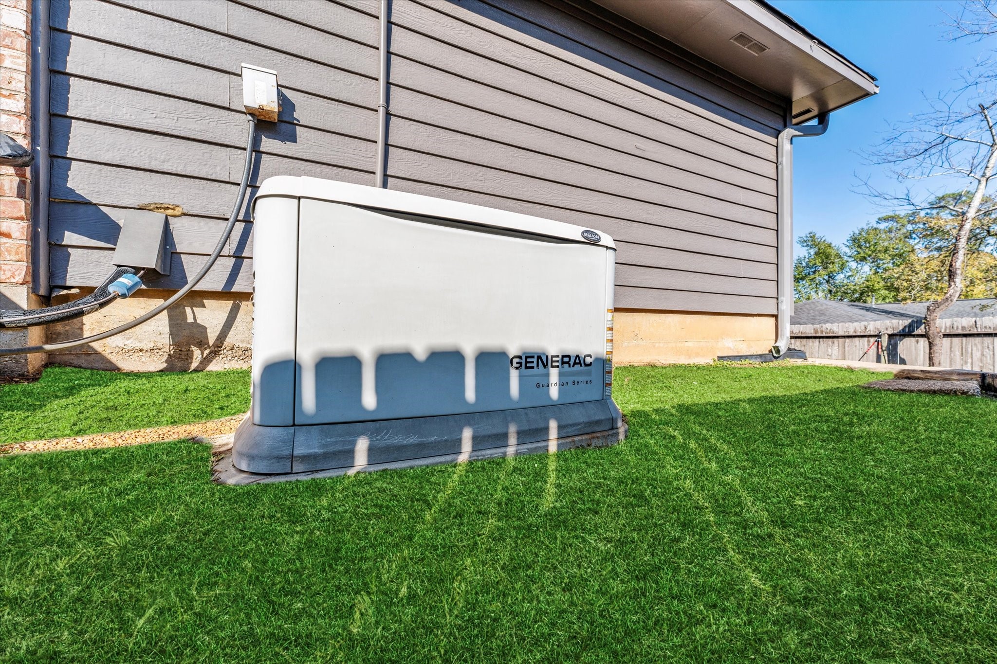 215 Deep Dale Lane Conroe, TX 77304 - Photo 30 of 34 Standby generator is already in place!