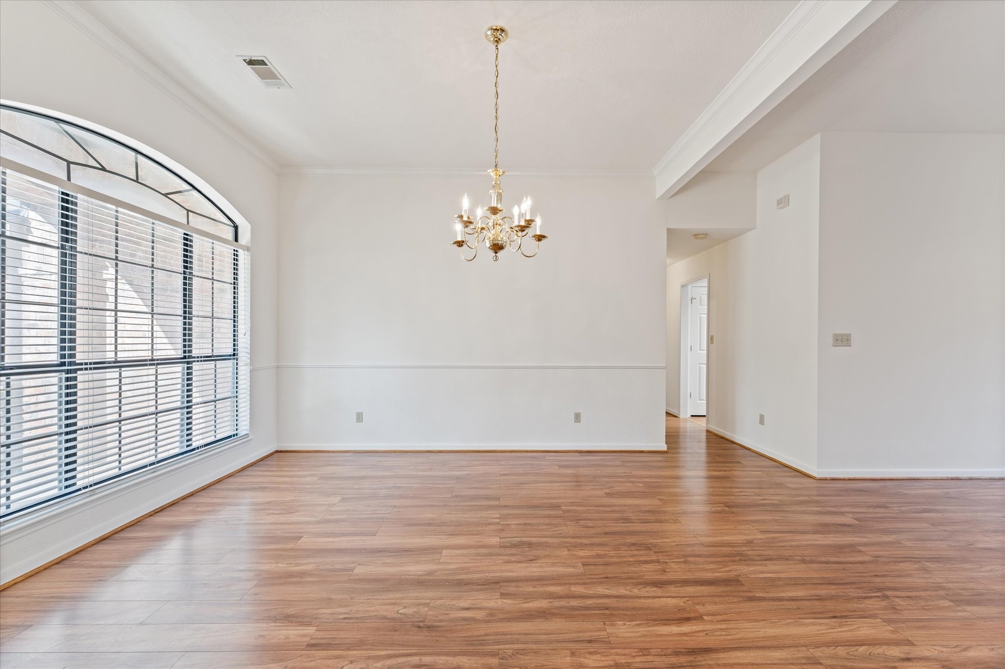 215 Deep Dale Lane Conroe, TX 77304 - Photo 7 of 34 Dining room opens up to the living space.