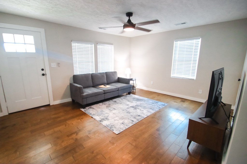 244 West Bockman Way Sparta, TN 38583 - Photo 11 of 23 a living room with furniture rug and a window