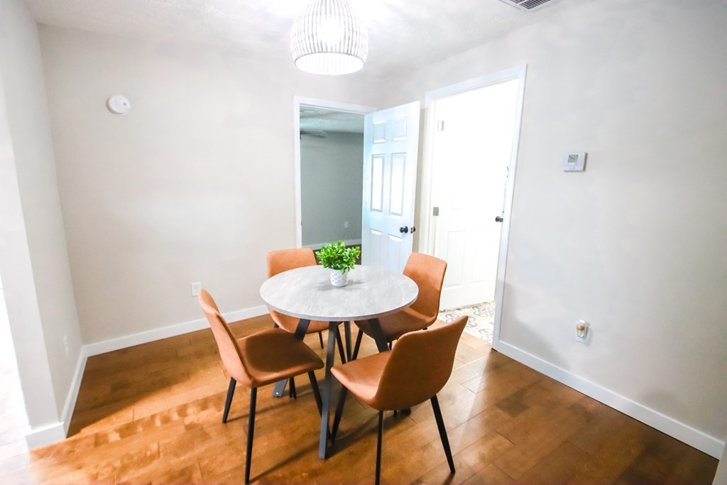 244 West Bockman Way Sparta, TN 38583 - Photo 12 of 23 a view of a dining room with furniture and wooden floor