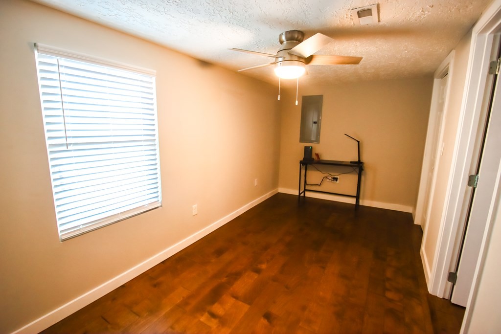 244 West Bockman Way Sparta, TN 38583 - Photo 21 of 23 a view of a room with wooden floor and a window