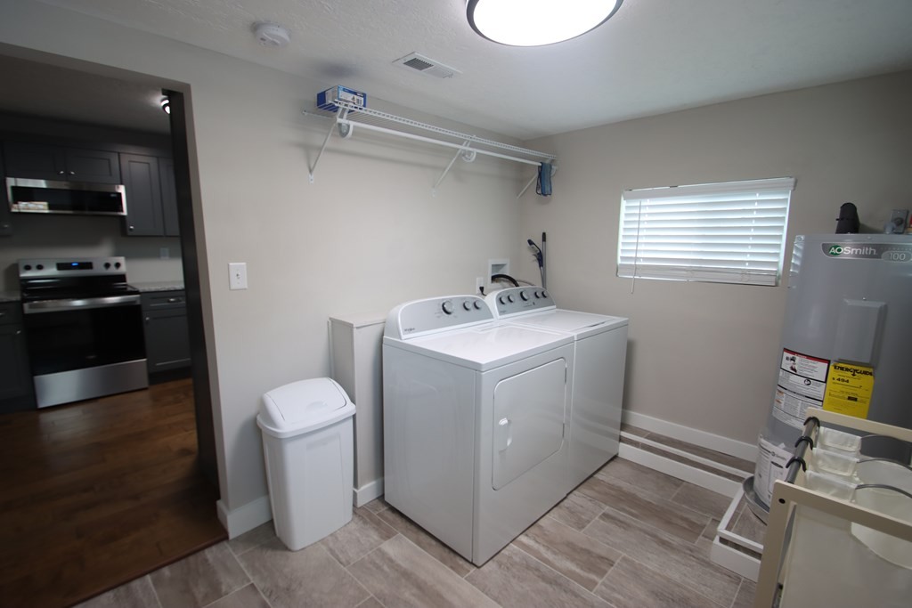 244 West Bockman Way Sparta, TN 38583 - Photo 22 of 23 a view of a bathroom with a sink and wooden floor
