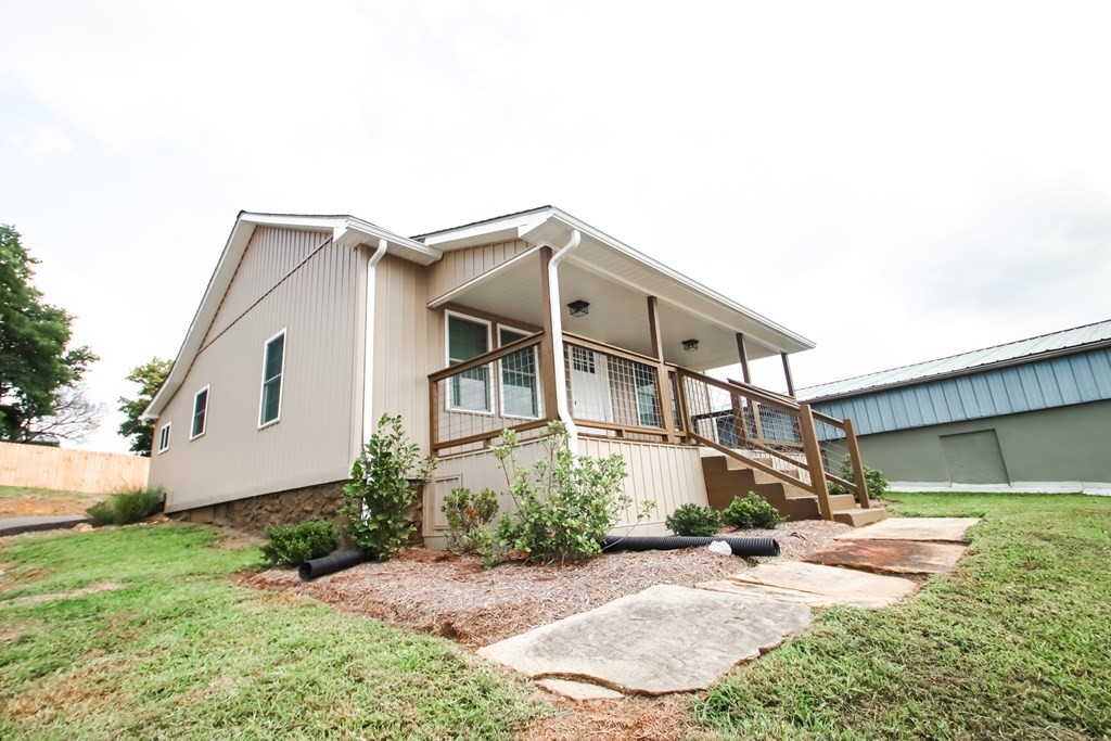 244 West Bockman Way Sparta, TN 38583 - Photo 4 of 23 a front view of a house with a yard