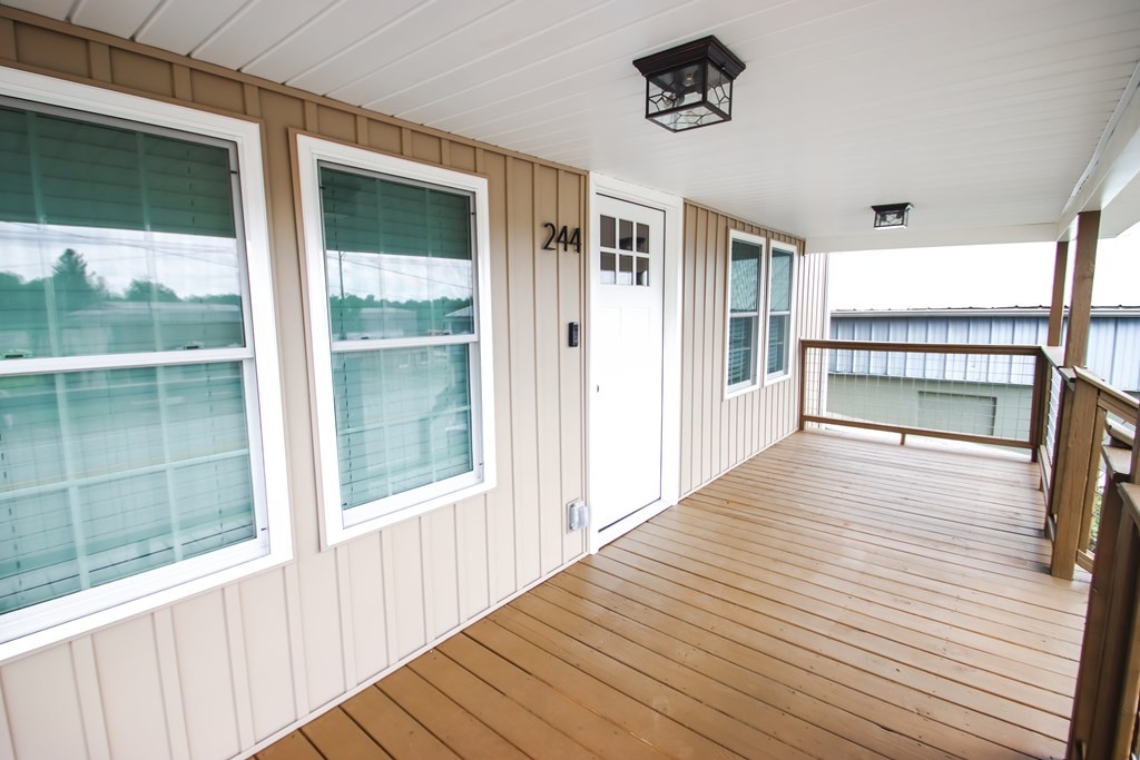 244 West Bockman Way Sparta, TN 38583 - Photo 7 of 23 a view of a room with wooden floor and windows