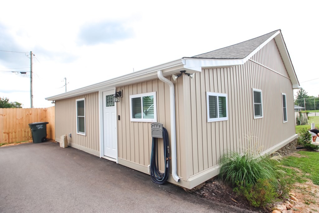 244 West Bockman Way Sparta, TN 38583 - Photo 9 of 23 a view of a house with a backyard