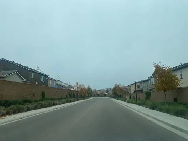 a front view of a building with a street