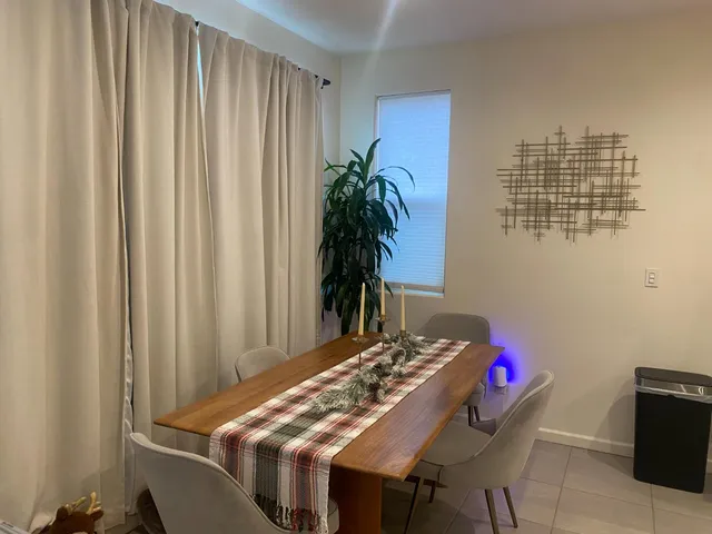 a table and chairs in a room