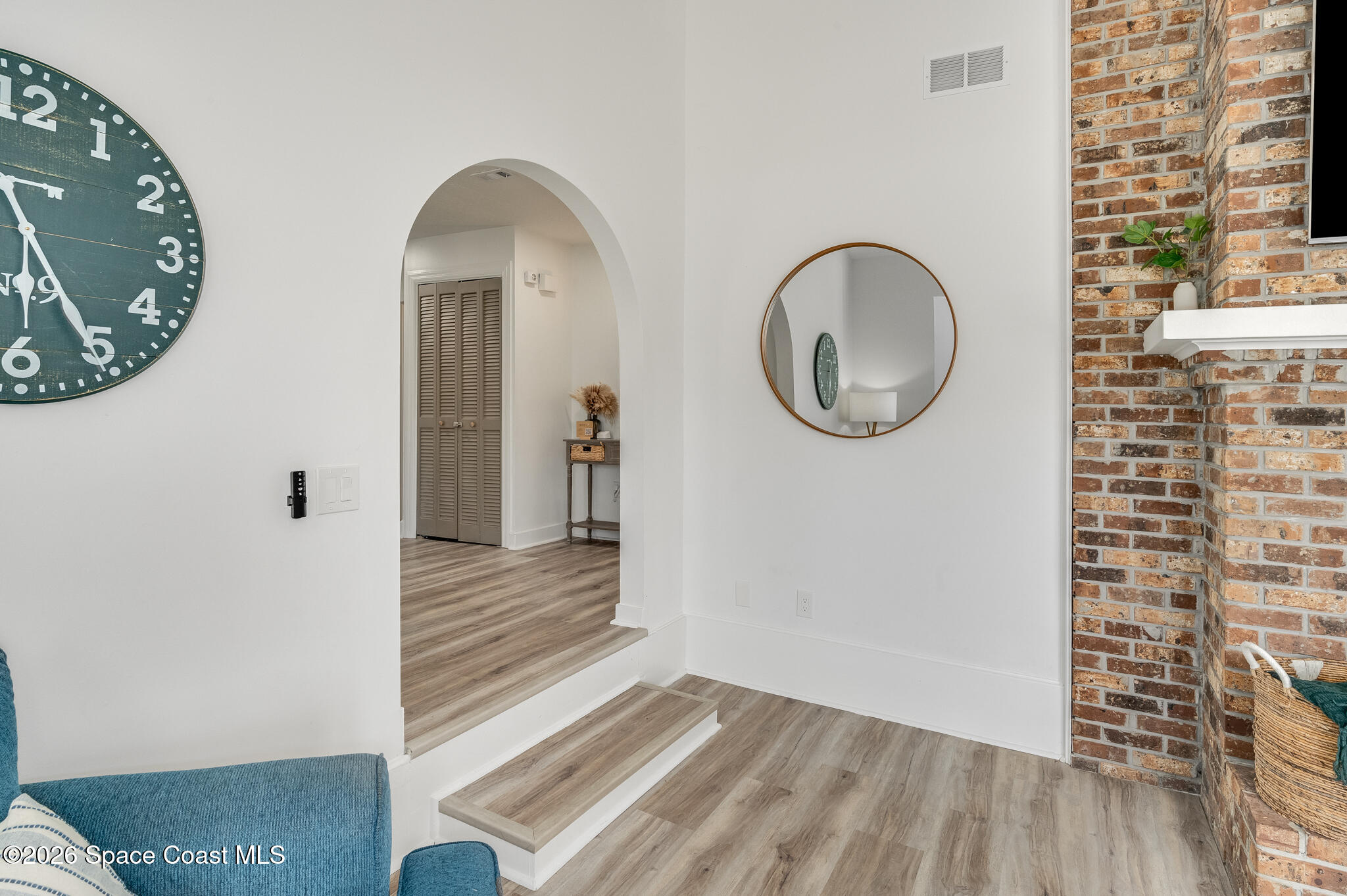 999 Sunswept Road Northeast Palm Bay, FL 32905 - Photo 11 of 85 Foyer to living room