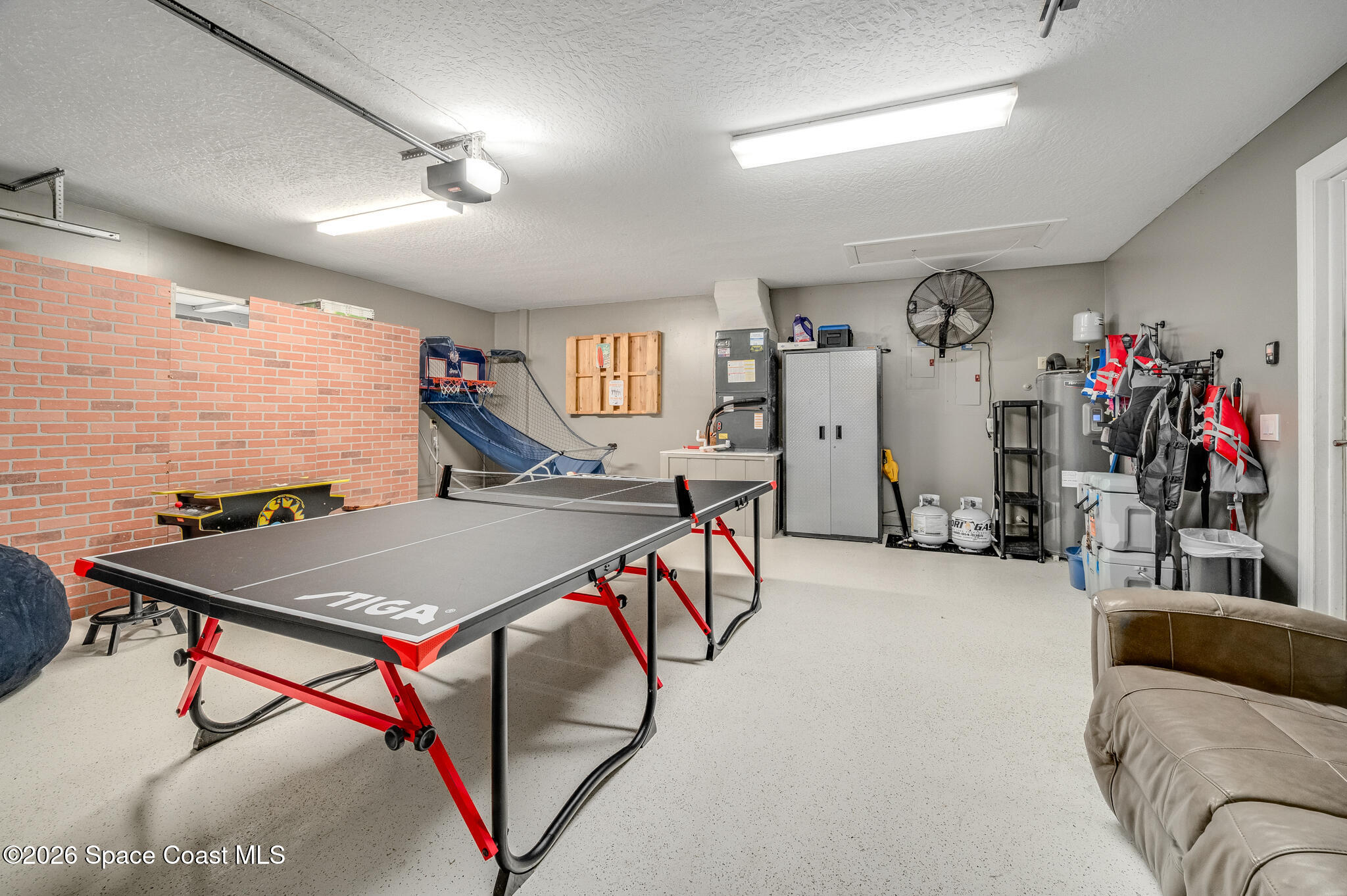999 Sunswept Road Northeast Palm Bay, FL 32905 - Photo 56 of 85 Play Room - Garage