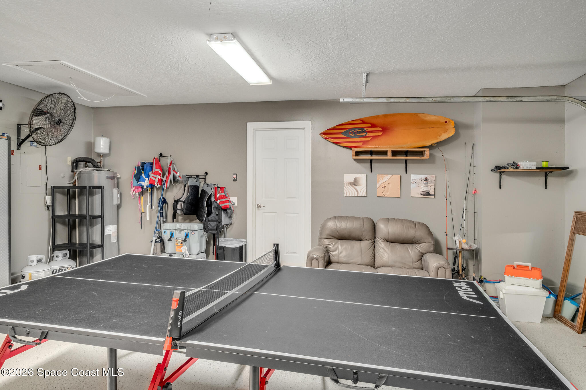 999 Sunswept Road Northeast Palm Bay, FL 32905 - Photo 57 of 85 Play Room - Garage