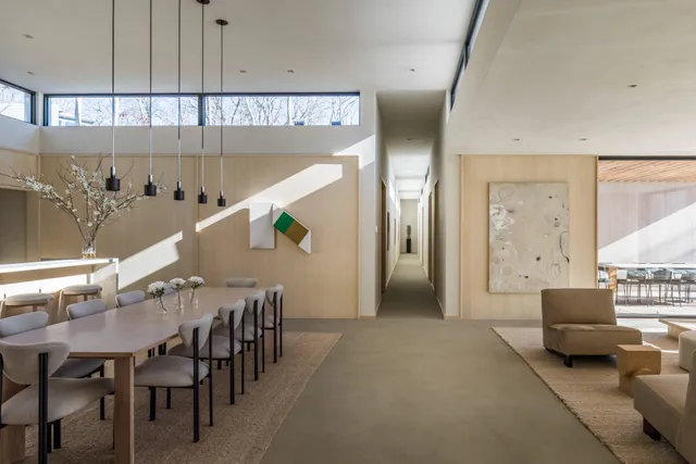 a balcony with table and chairs