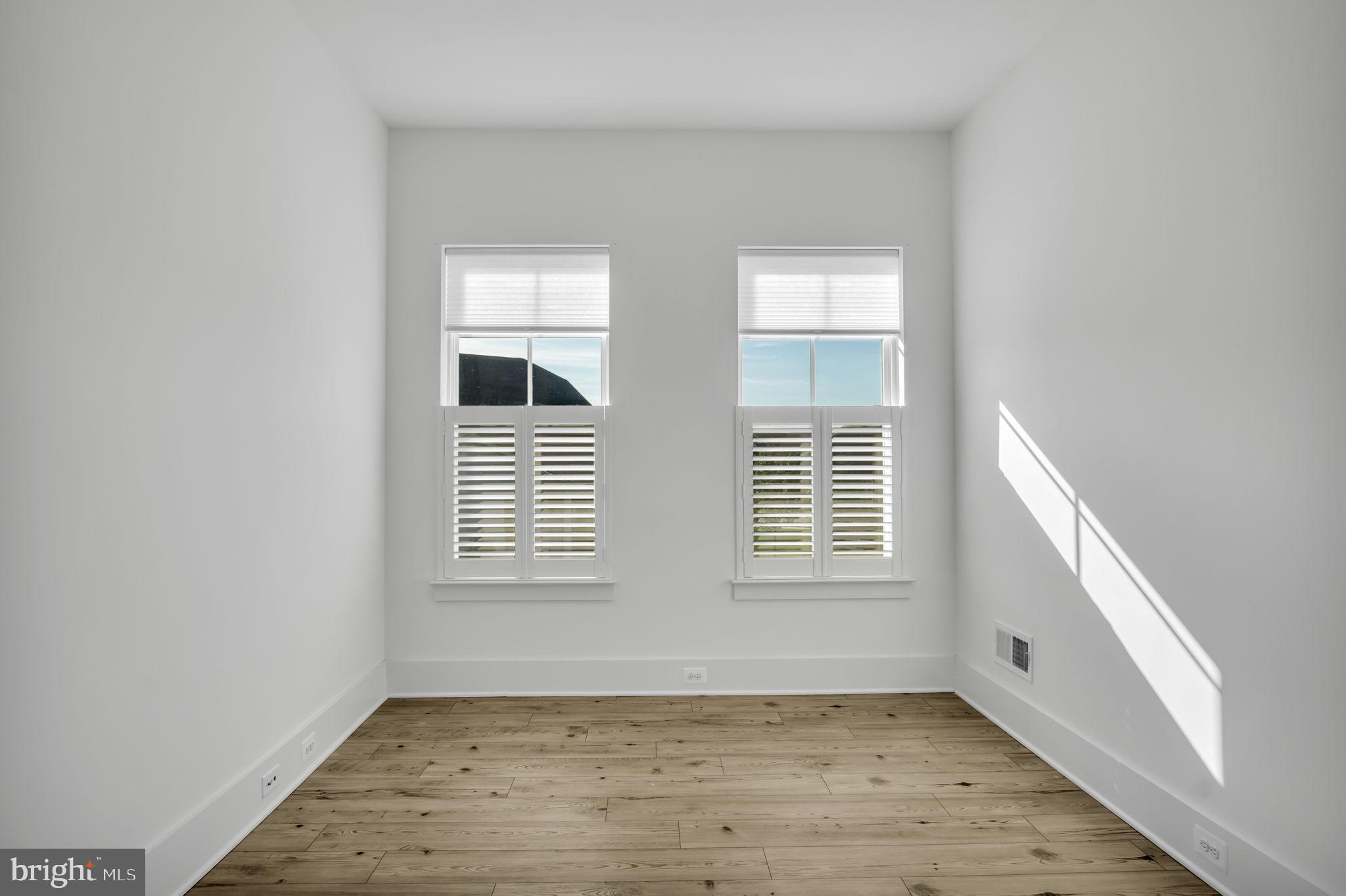 23 Highland View Lane Gettysburg, PA 17325 - Photo 30 of 87 a view of an empty room with wooden floor and a window