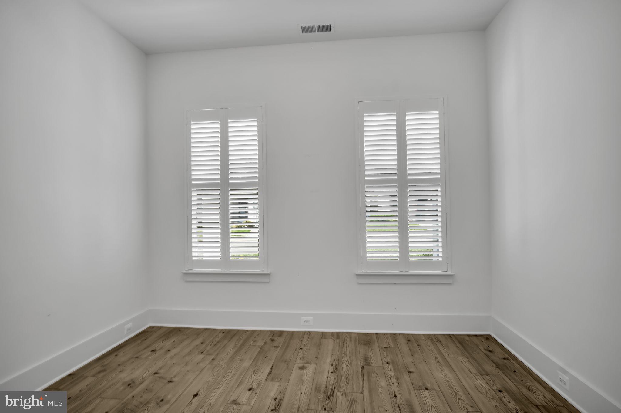 23 Highland View Lane Gettysburg, PA 17325 - Photo 38 of 87 an empty room with wooden floor and windows