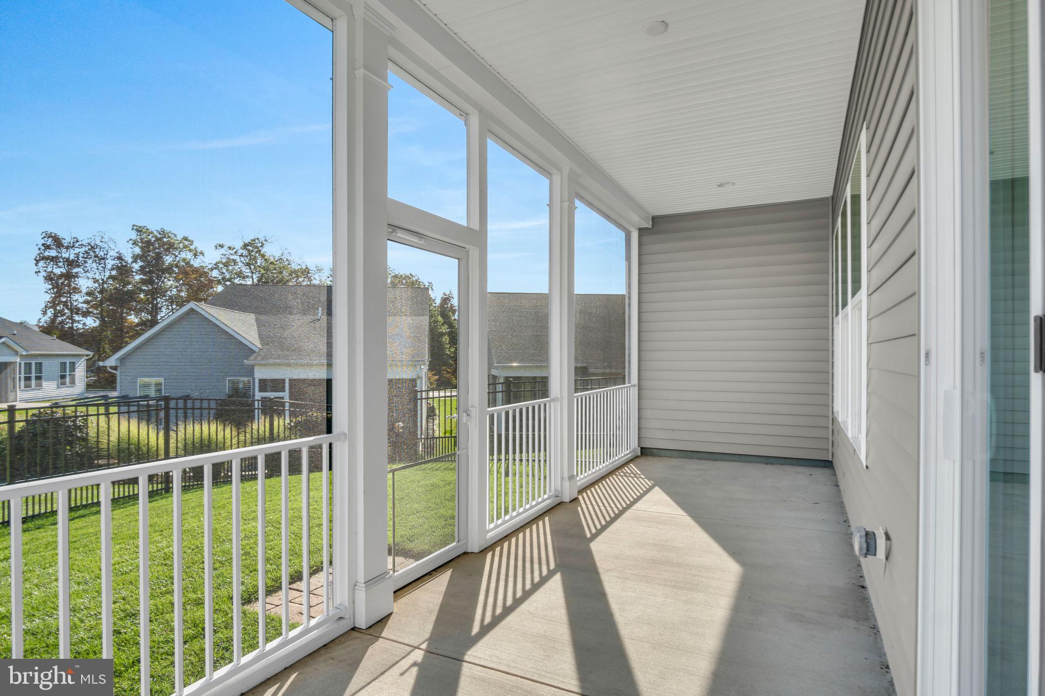 23 Highland View Lane Gettysburg, PA 17325 - Photo 42 of 87 a view of balcony with floor to ceiling window and wooden floor
