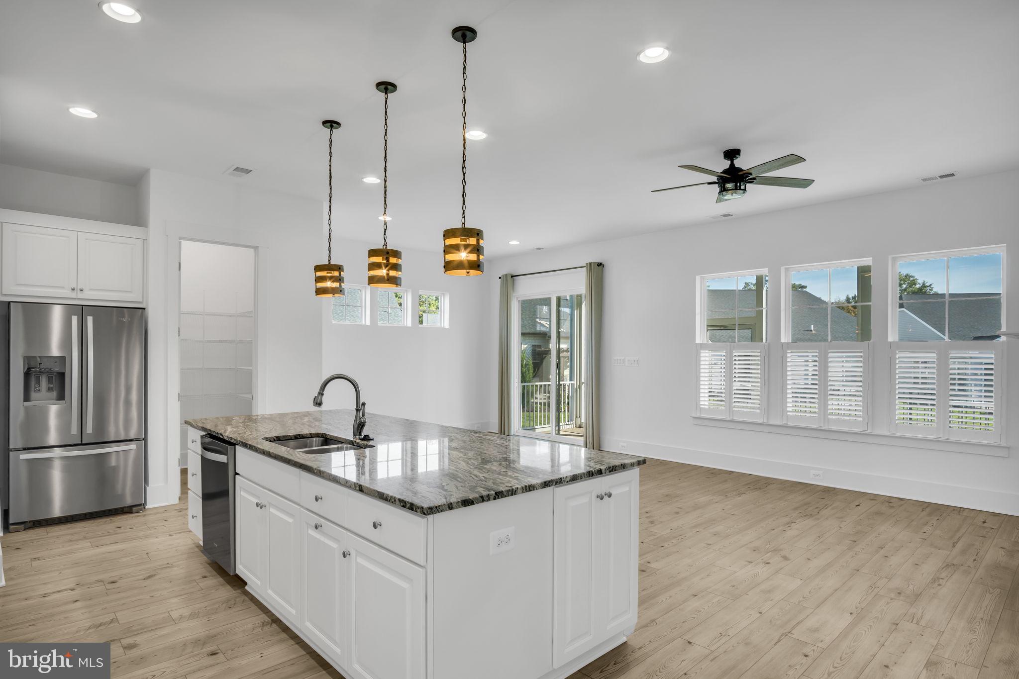 23 Highland View Lane Gettysburg, PA 17325 - Photo 10 of 87 a kitchen with stainless steel appliances granite countertop a sink a refrigerator and a granite counter tops
