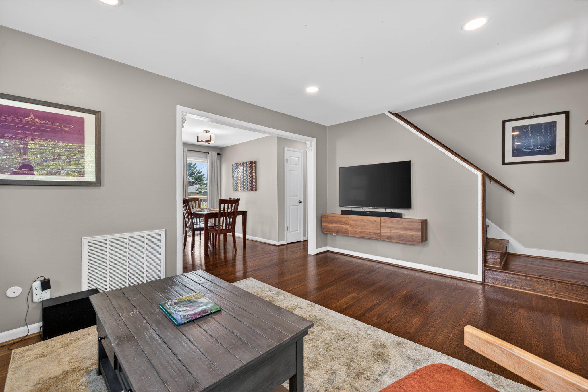 1002 Wilson Place Frederick, MD 21702 - Photo 4 of 30 a living room with furniture and a flat screen tv