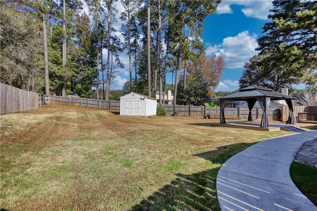 5113 Brownlee Road Southwest Lilburn, GA 30047 - Photo 38 of 48 a view of outdoor space yard and patio