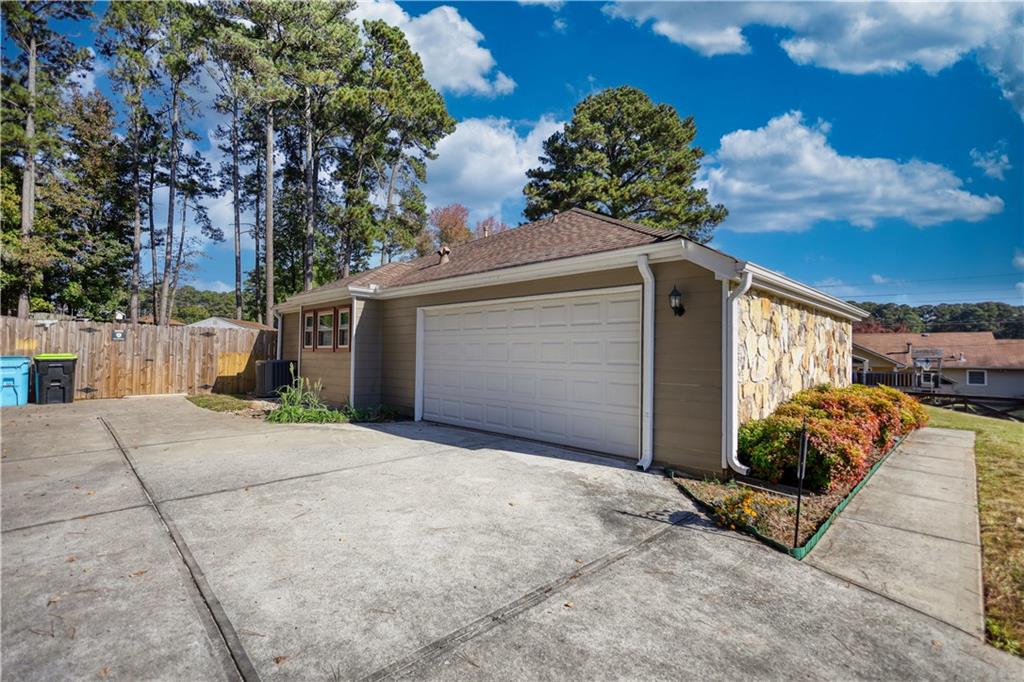 5113 Brownlee Road Southwest Lilburn, GA 30047 - Photo 40 of 48 a view of a house with a street