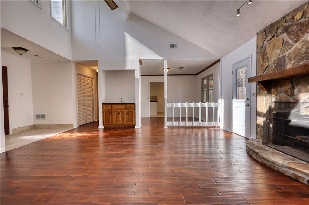 5113 Brownlee Road Southwest Lilburn, GA 30047 - Photo 6 of 48 a view of an entryway with wooden floor
