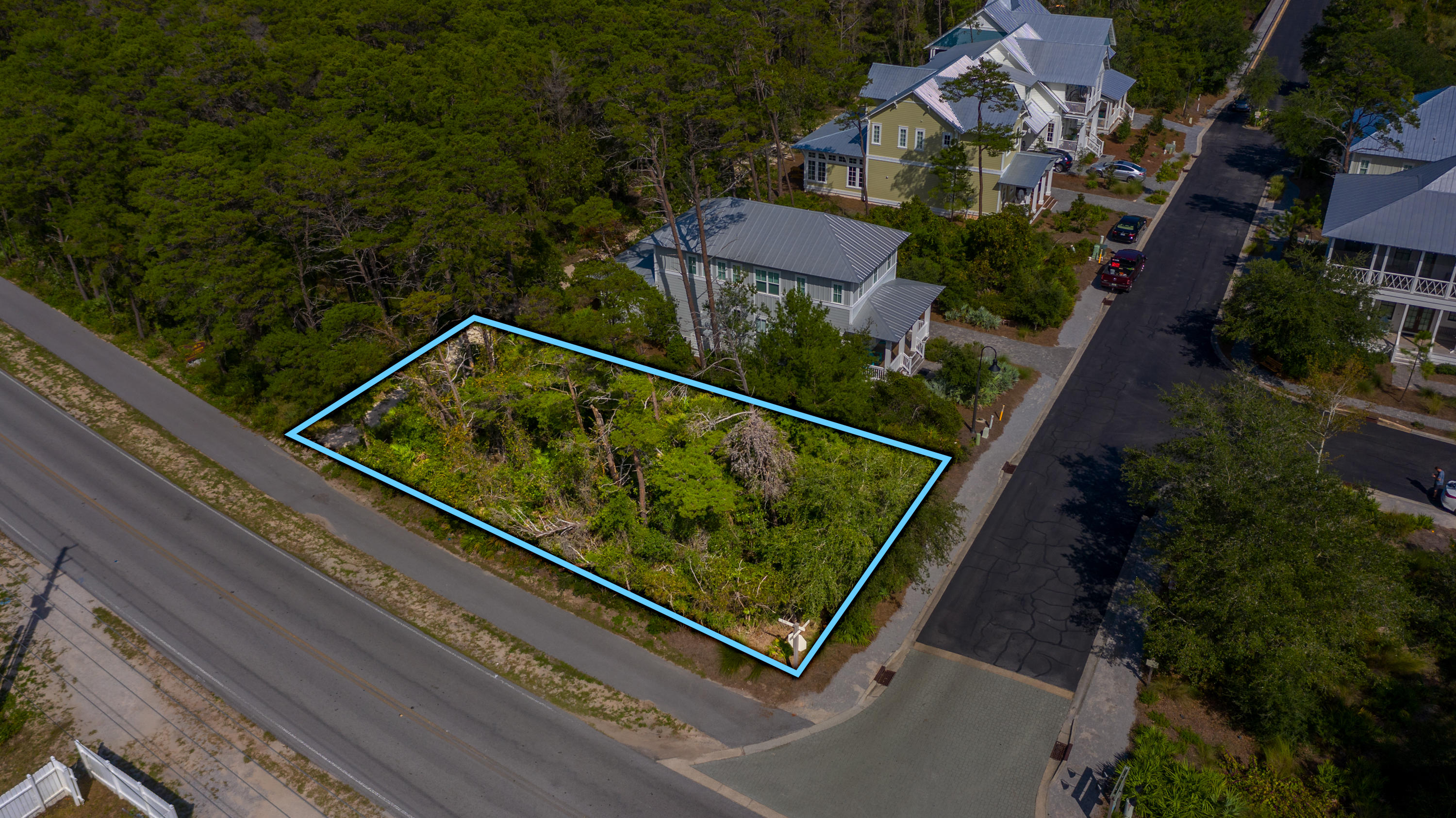 Lot 74 Matts Way Santa Rosa Beach, FL 32459 - Photo 2 of 11 an aerial view of a house with a garden