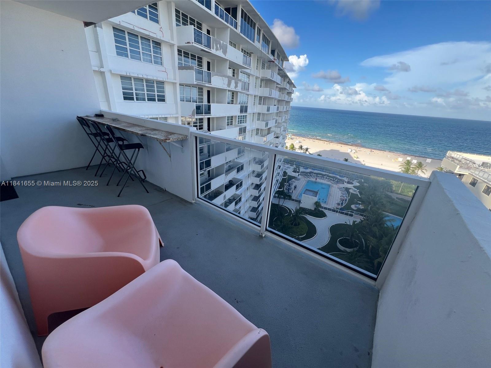 100 Lincoln Road, Unit 1419 Miami Beach, FL 33139 - Photo 6 of 57 a view of balcony with furniture