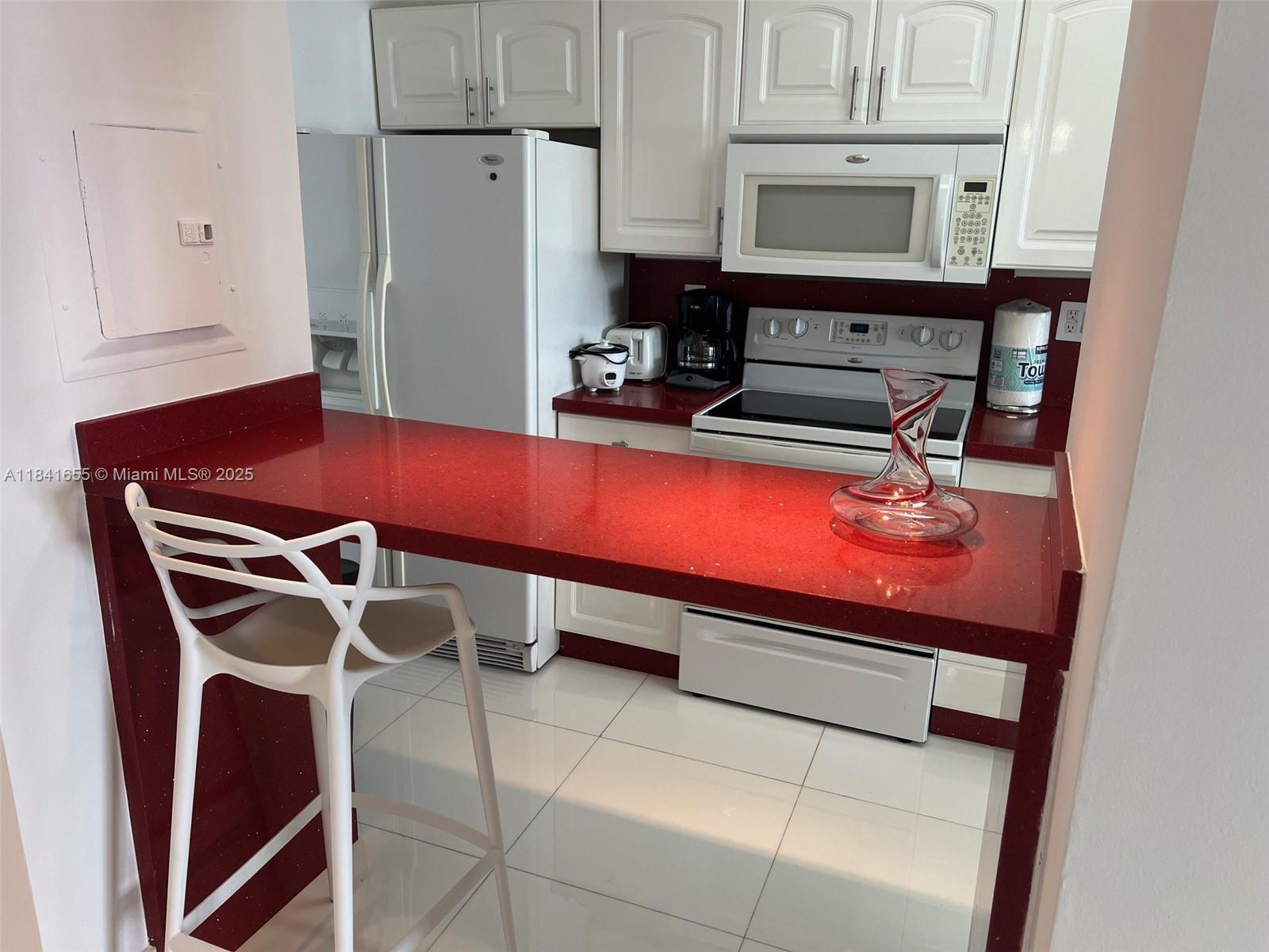 100 Lincoln Road, Unit 1419 Miami Beach, FL 33139 - Photo 9 of 57 a room with pool table and chairs