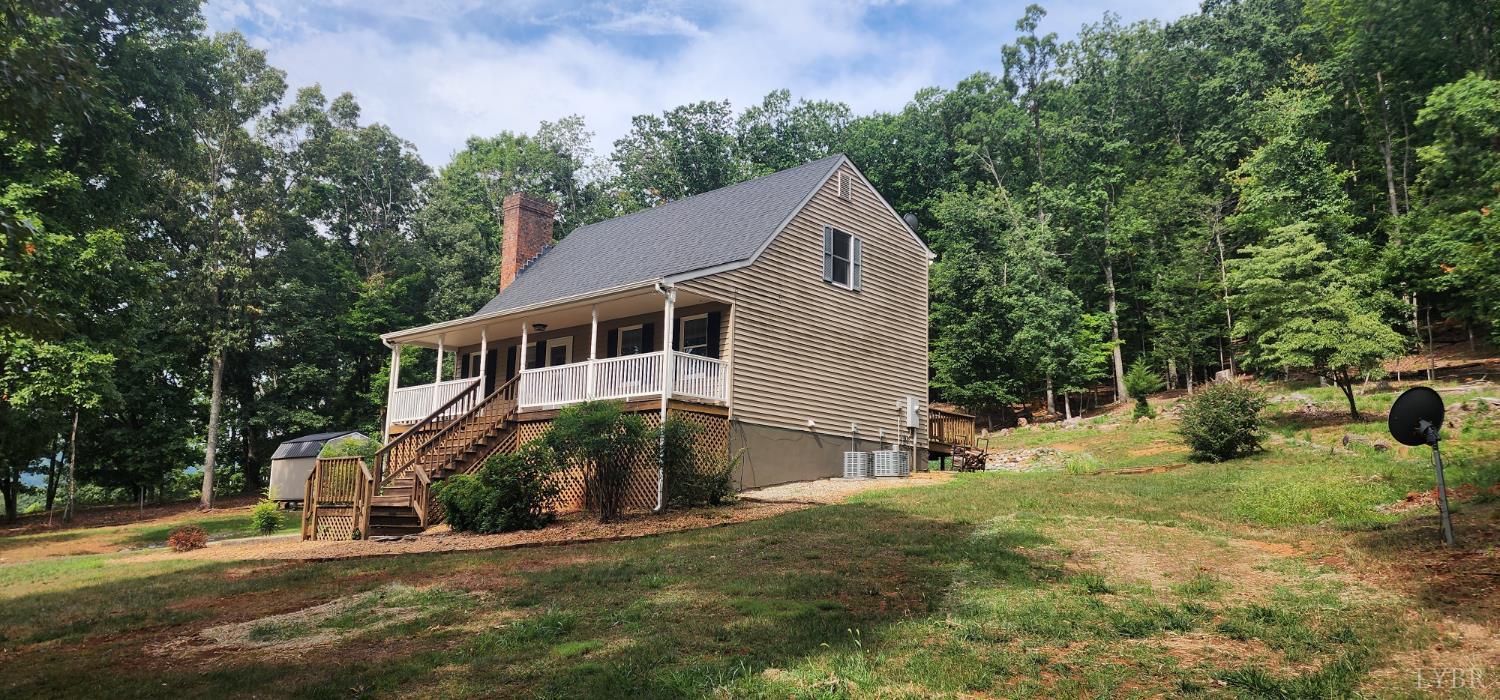 297 Poor House Farm Road Amherst, VA 24521 - Photo 3 of 52 a house that has yard in front of it