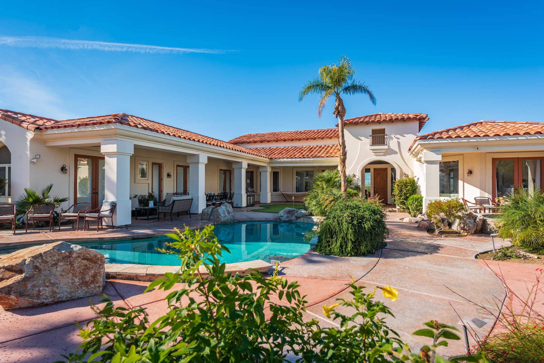 a front view of a house with patio