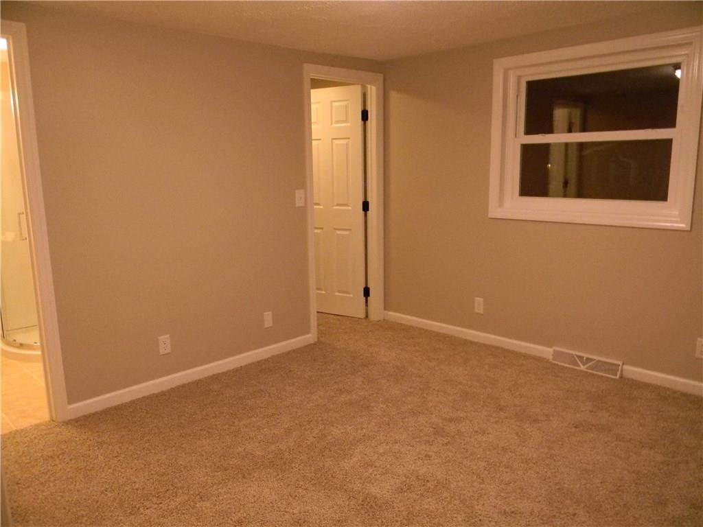 600 State Street Butler, PA 16001 - Photo 10 of 19 Master bedroom with master bath and walk in closet