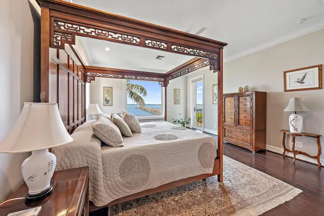 a view of a hallway with dining area and glass door