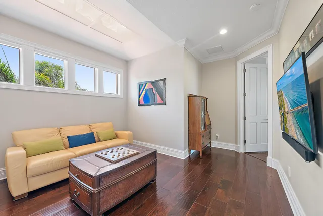 a view of a house with a yard and sitting area