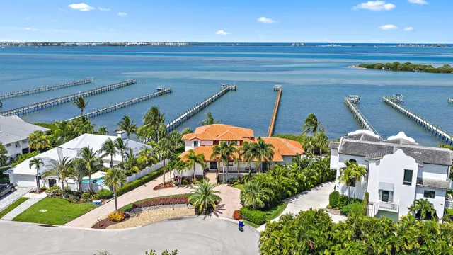 an aerial view of a house with outdoor space pool patio and outdoor seating
