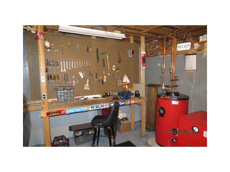 224 Intervale Road New Gloucester, ME 04260 - Photo 16 of 20 Shop/Service Bay(s). Workshop Downstairs