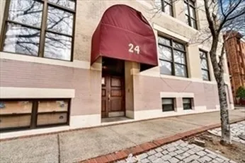 a front view of a house with a garage
