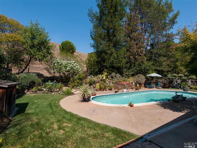 72 De La Guerra Road San Rafael, CA 94903 - Photo 1 of 1 Sparkling pool and garden areas