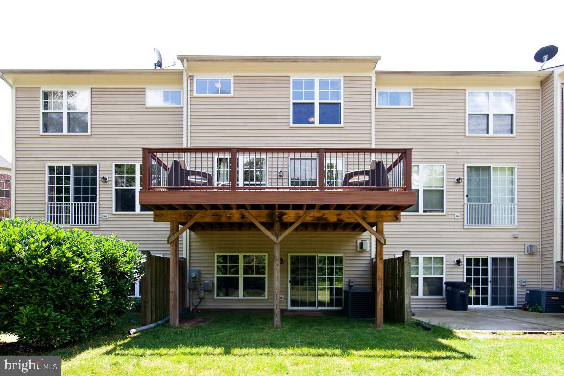 9079 Ribbon Falls Loop Bristow, VA 20136 - Photo 22 of 22 Trex Deck off Kitchen