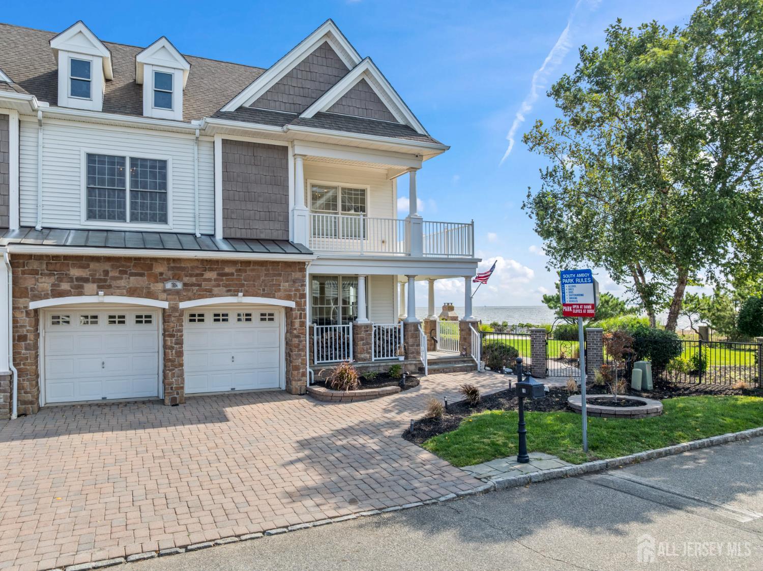 76 Raritan Reach Road South Amboy, NJ 08879 - Photo 17 of 69 a front view of building with yard