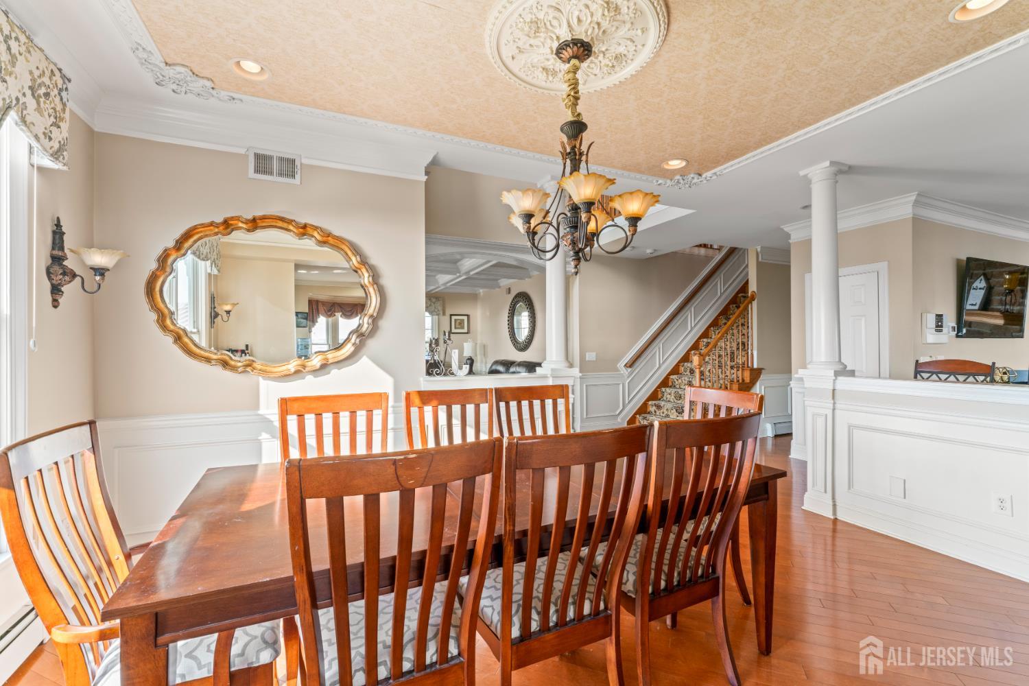 76 Raritan Reach Road South Amboy, NJ 08879 - Photo 44 of 69 workspace with wooden floor windows and a chandelier