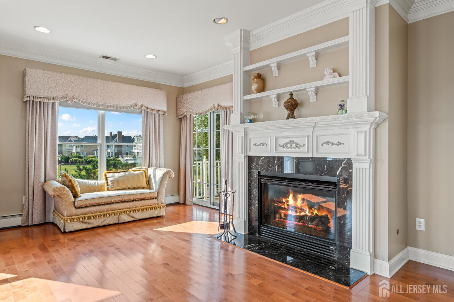 76 Raritan Reach Road South Amboy, NJ 08879 - Photo 47 of 69 a living room with furniture and a fireplace