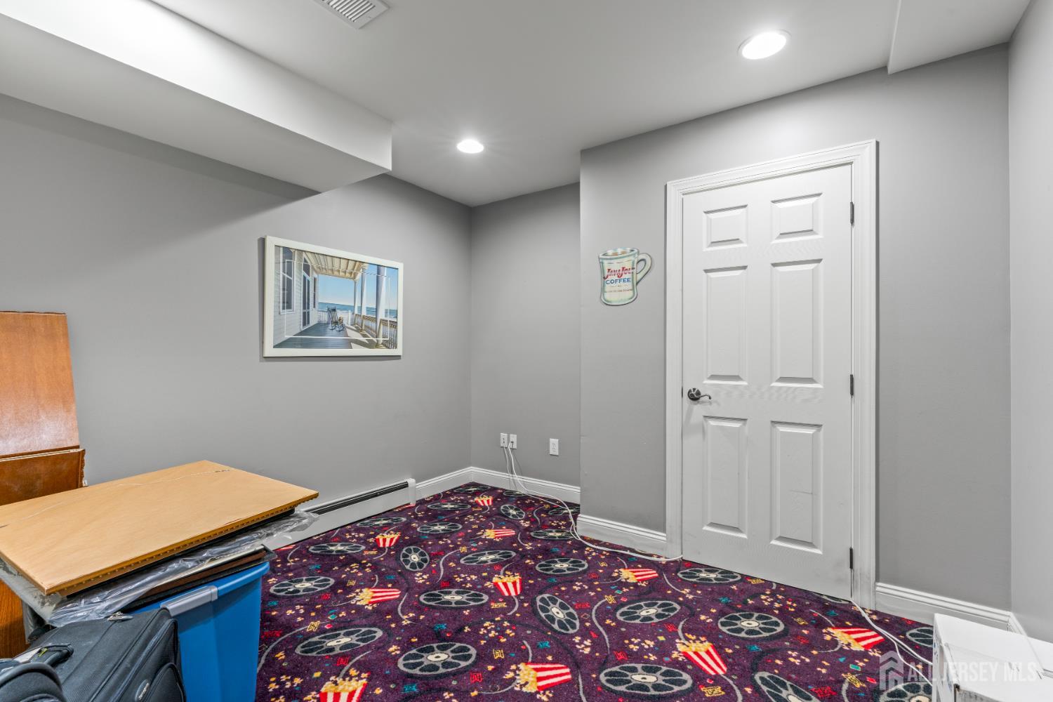 76 Raritan Reach Road South Amboy, NJ 08879 - Photo 64 of 69 a bedroom with a bed and a lamp on the dresser