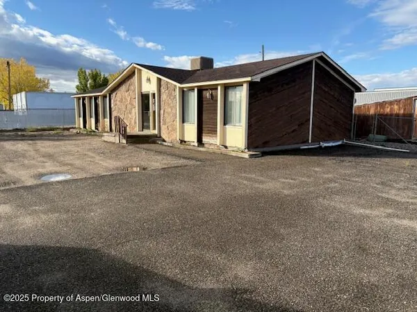 a view of a house with a garage
