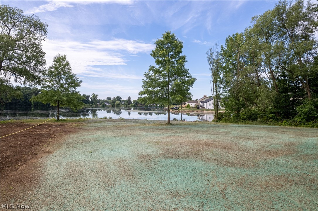 5796 Springlake Road Northwest Canton, OH 44718 - Photo 5 of 50 View of backyard with water view