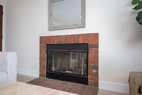 a living room with a fireplace
