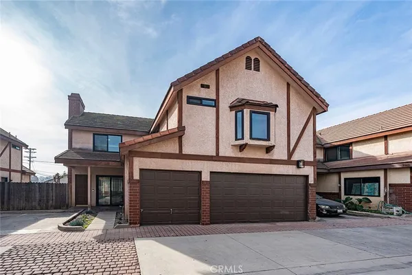 a view of a house with a garage