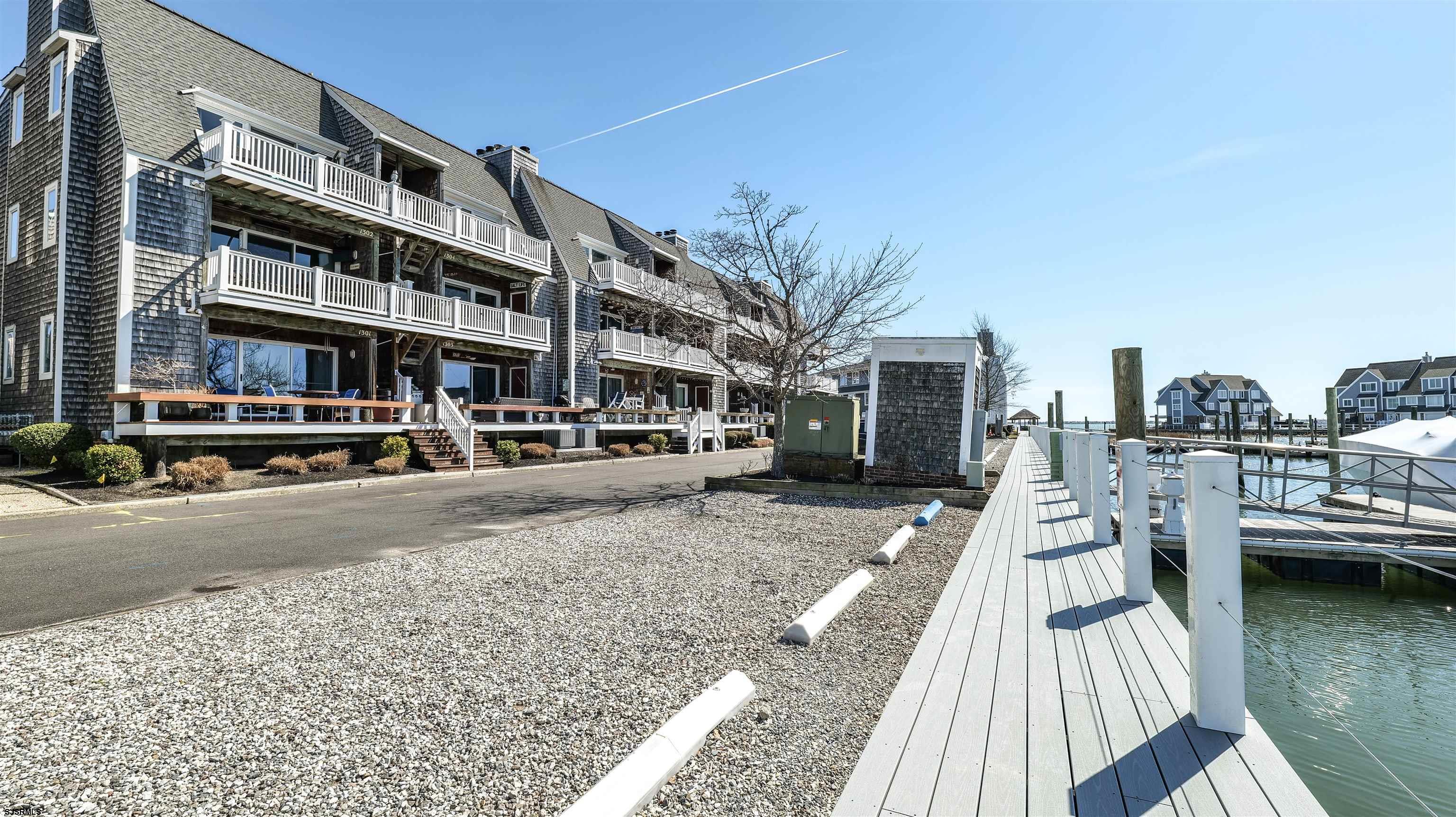 1301 Harbour Cove, Unit 1301 Somers Point, NJ 08244 - Photo 1 of 39 a city view with tall buildings